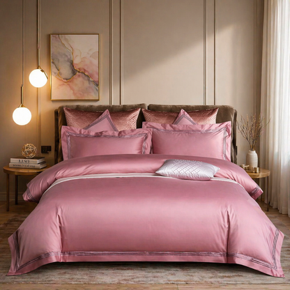 Bedroom with floral bedding and purple pillows